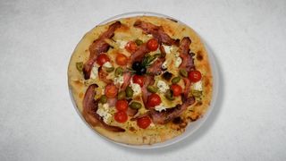 Pizza Prosciutto crudo Porcini e rucola