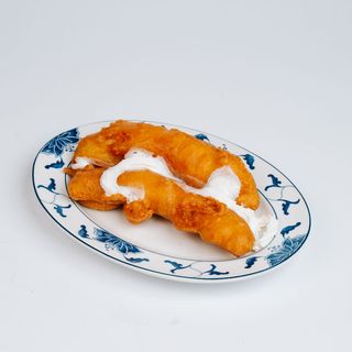 Banan w cieście z miodem i bitą śmietaną 200g