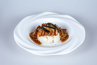 74. Riso con cotoletta di maiale, cipolla e uova