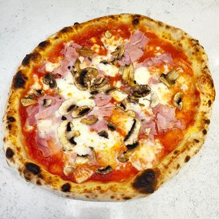 Prosciutto e funghi