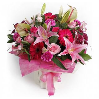 Bouquet con gigli, gerbere e rose