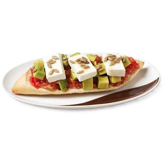 Tosta De Aguacate Con Queso Fresco Y Tomate Con Pipas