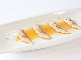 110. Carpaccio Suzuki flambé - 10 pz