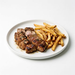 Solomillo De Cerdo Con Papas Fritas