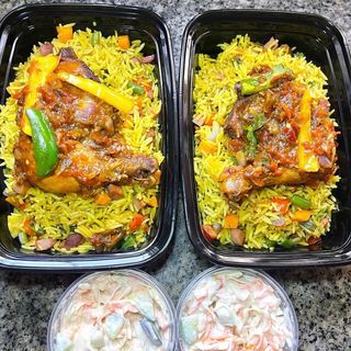 Odogwu fried rice, chicken and salad