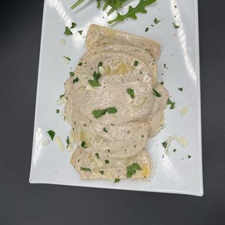 Raviolo de Boletus con salsa de Trufa