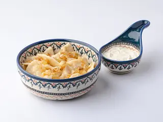 Вареники з картоплею та смаженою цибулею зі сметаною (350/50g)