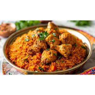 Chicken Jollof Rice + Fries + Pet Drinks