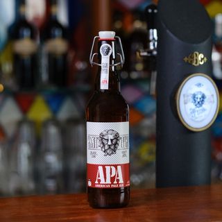 ლუდი შავი ლომი APA - ბოთლი  0,5 - იანი