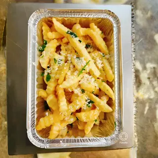 cartofi prajiti cu parmesan si patrunjel, ulei de trufe 250 gr