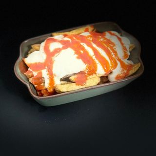 Ración De Patatas Bravas