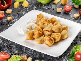 Пельмени жареные 