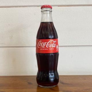 Coca in vetro 0.33