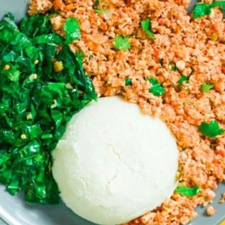 Ugali with vegetables and scrambled eggs