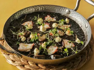 Risotto nero di calamaro con pulpo