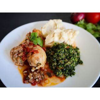 Wet fried chicken with posho and greens