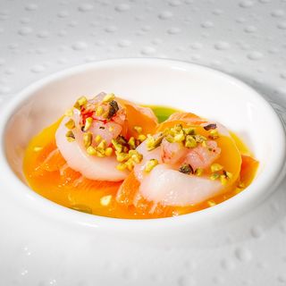 103. Carpaccio di salmone e capesante