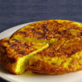 Tortilla de patatas con setas para 4-5 pax