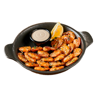 Креветки обжаренные с соусом.