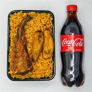 A Plate Of Rice With Fish + Coca Cola Original PET