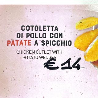 Cotoletta di pollo con patate a spicchi