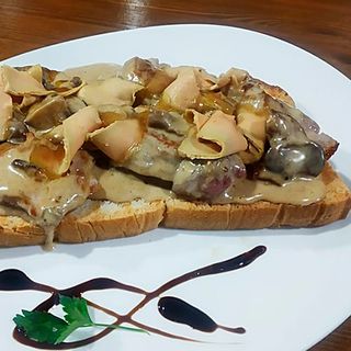 Tostada De Solomillo De Cerdo Con Salsa De Boletus 