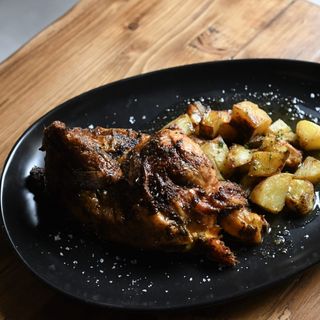 Medio pollo "de la terra" a la brasa