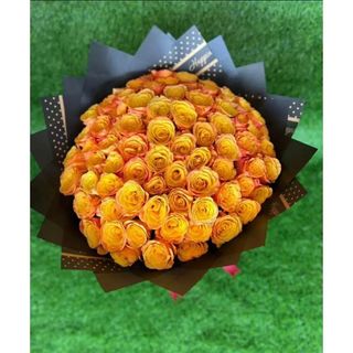 A bliss of orange roses with a gift card