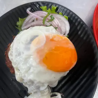 Bolon de verde con huevo frito 