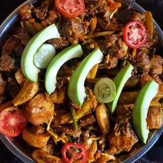 1½ kg fried pork with avocado, cabbage & matooke