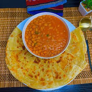 2 Chapati + Pojo ( Ndengu ) + Mango /Sugarcane Juice