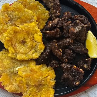 Bofe frito con patacones