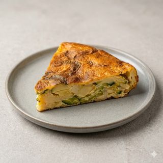 Tortilla Patatas y Calabacín (Porción)