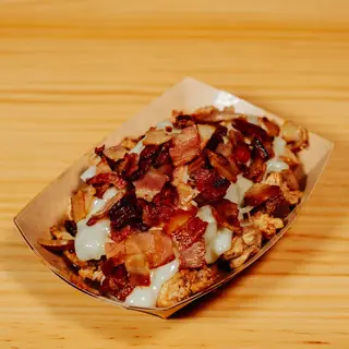 Pollo marinado con queso raclette DOP y bacon