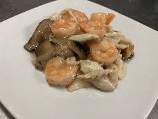 Pollo con gamberi e funghi