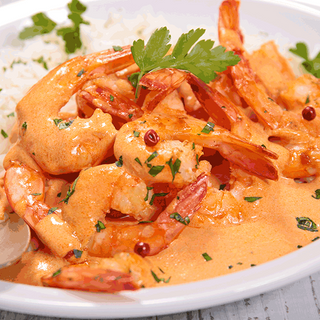 LANGOSTINOS AL CURRY