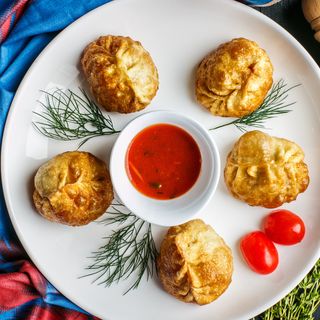 Жареные манты с говядиной и тыквой