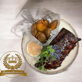 Scăriță BBQ cu cartofi in coajă cu parmezan și usturoi 