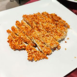 Pollo Frito Con Almendra En Salsa De Ciruela