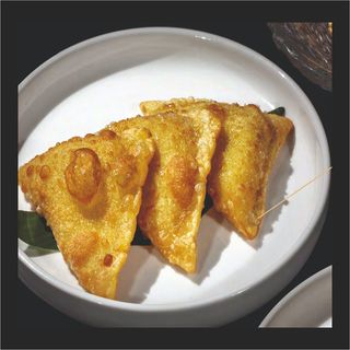 74 samosas pollo al curry  6und