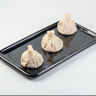 Хинкали с грибами в сливочном соусе (5 шт.)