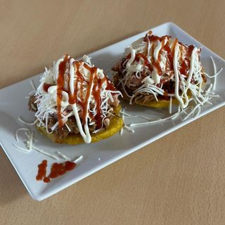 Tostones Pollo (2 und)