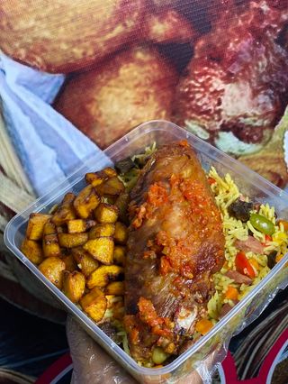 Fried rice, plantain and peppered turkey