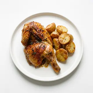 1/2 Pollo Asado Con Papas