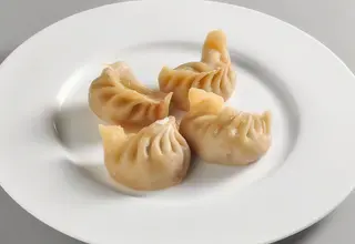 14. Ravioli di carne - 4 pezzi