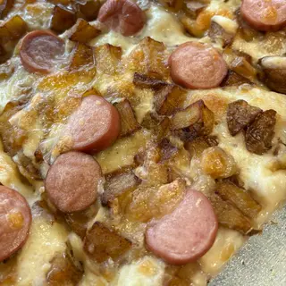 Trancio pizza wurstel e patate
