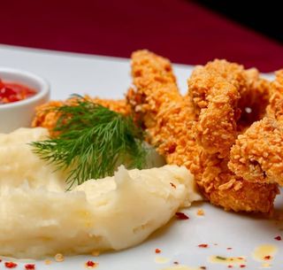 Degetele din piept de curcan pane