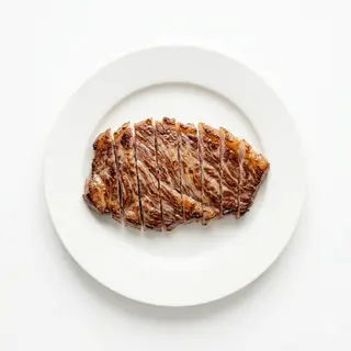 Secreto ibérico con salsa mostaza y miel