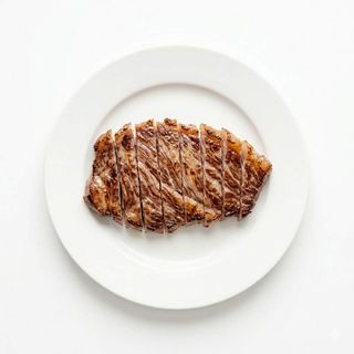 Secreto ibérico con salsa mostaza y miel