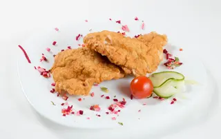 Snitel pane din piept de pui